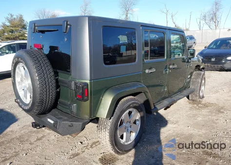 2009 Jeep Wrangler Unlimited Sahara z USA, uszkodzony, nr VIN 1J4GA59189L710032